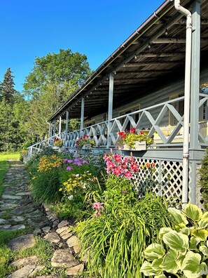 Kildare's garden beds and historic porch and front walkway