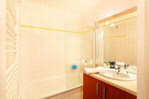 Get ready for your day in the lovely bathroom.