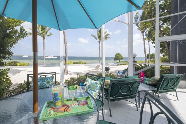 Dine & lounge while enjoying Caribbean breezes, watch boats sail by.