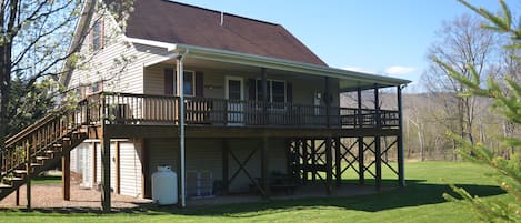 Large covered deck with gas grill