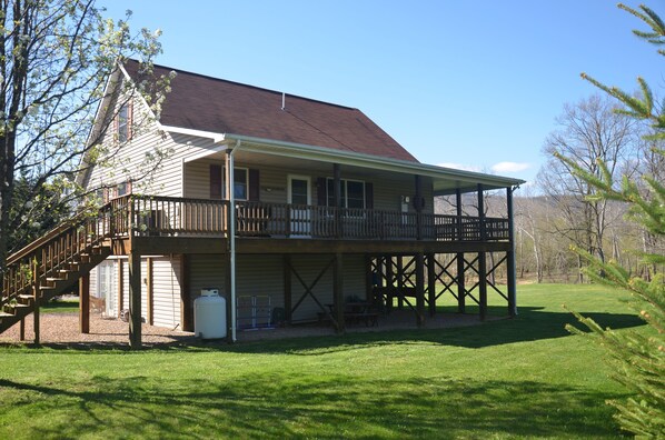 Large covered deck with gas grill