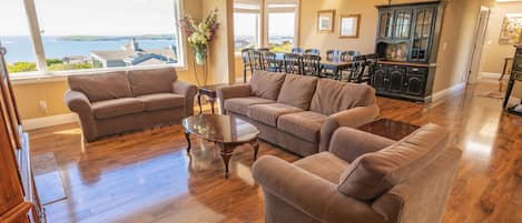 Main living/dining room with beautiful views of the ocean!