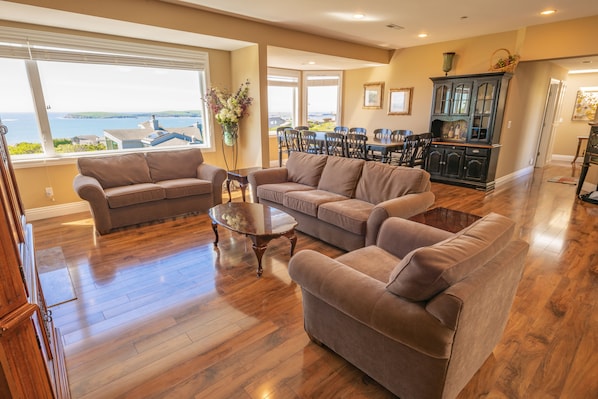 Main living/dining room with beautiful views of the ocean!