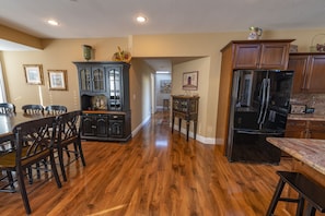 North view of the living area. The kitchen includes a weather vein.