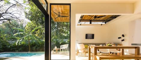 Open the sliding doors to enjoy the indoor/outdoor living of Nosara, Costa Rica!