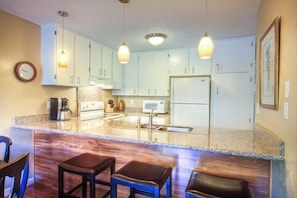Remodeled kitchen with granite and fully equipped