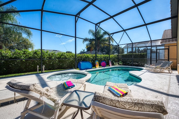 Welcome to your private 5 star vacation!  Heated, screened in pool and spa!