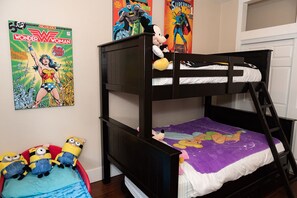 A fun bunk room with Full / Twin / Twin (trundle) bed and toddler bed.