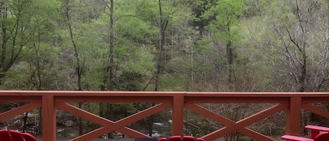 Large front deck with a view of Long Cove Mountain and a few of the Green River