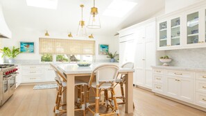 Carrera marble kitchen w/ French white oak floors & Wolf/Subzero appliances