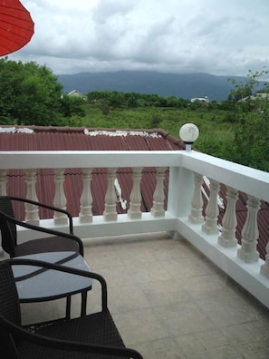 balcony seatings already enhanced with greens, before transformation for guests