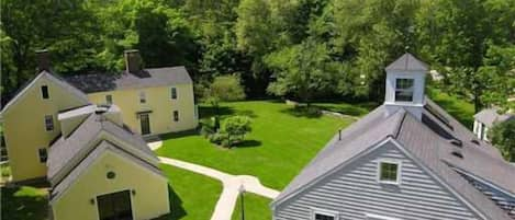 Looking at Arundel Farm from above with the Carriage House on the right.