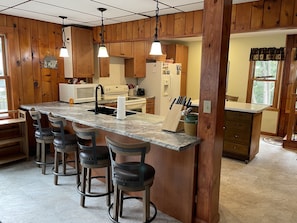 Spacious open kitchen - with breakfast bar.