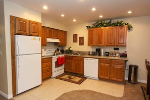 Kitchen is open to living and dining area and has everything you will need