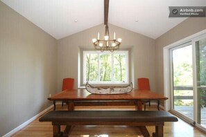 The dining room seats 10, has views and opens out to the main deck..