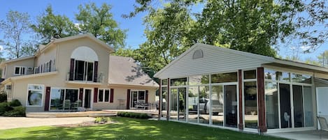 Main house with screened & glass sunroom. The sunroom is not climate contolled. 