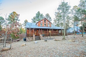 Cabin Front - large parking areas, fire pit, full porch with swing and seating