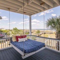 Swing bed on the front porch