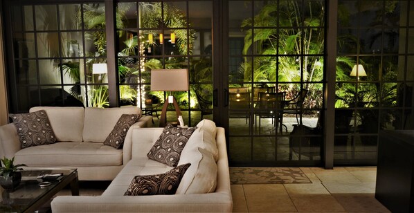 Living Room Looking at Patio Outside at Night