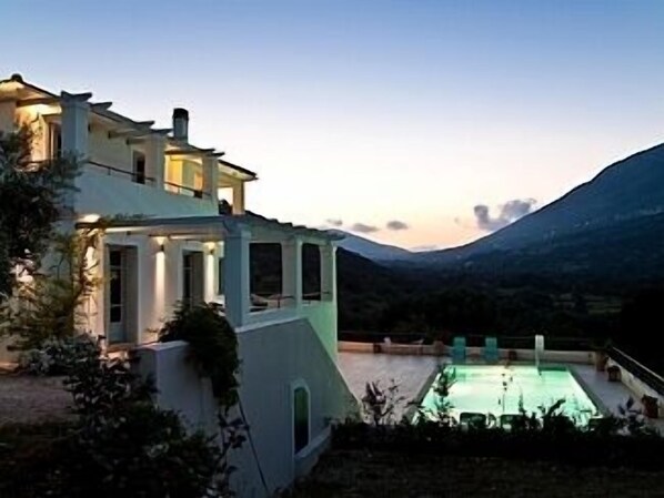 Night View of Zephyros and Heated Swimming Pool