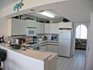 Large kitchen has new appliances and every amenity.