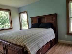 Queen Master Bedroom with picture window view & en suite bathroom