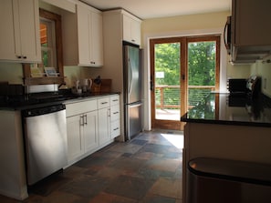 New kitchen with Kenmore Elite appliances is well equipped for a cook's needs.