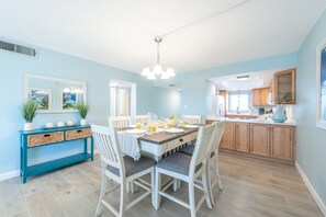 Spacious dining area with a table for six, perfect for meals and gatherings