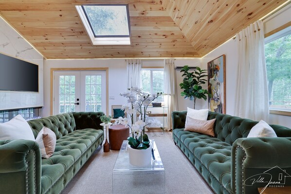 Second Floor Family Room with Smart TV, Fireplace, Skylight, Access to Wrap Around Deck