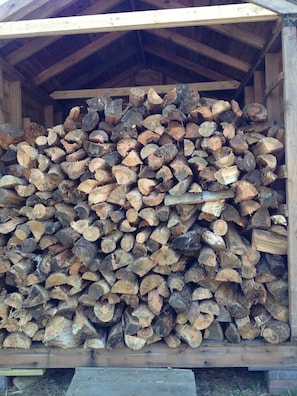 Our wood shed for the outdoor fire pit was fully stacked in June