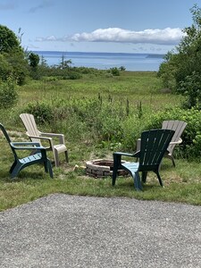 Cottage style home with a chef's kitchen, beautiful view and short walk to beach