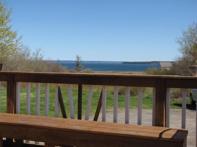 Cottage style home with a chef's kitchen, beautiful view and short walk to beach