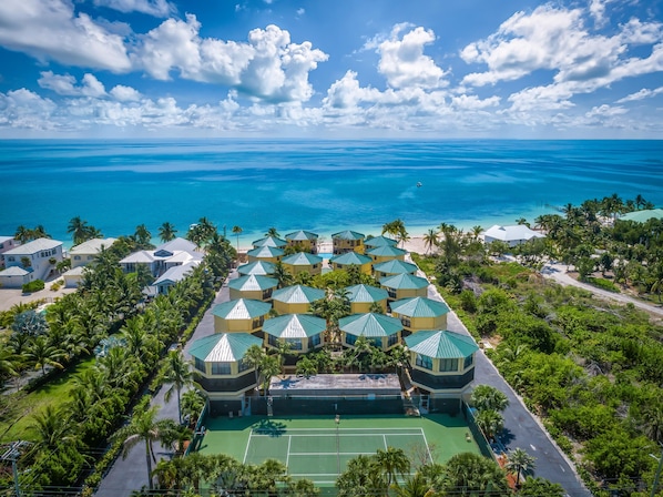 Aerial view of tennis court and property to the Atlantic Ocean & Beach