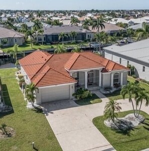 Modern home with easy access circular driveway 