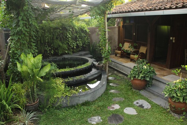 Single Room in a two bedroom bungalow, facing a natural dipping pool and garden