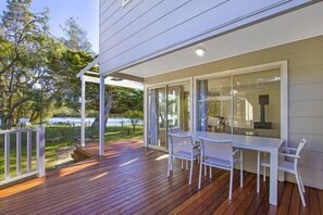 Deck at rear of house overlooking creek