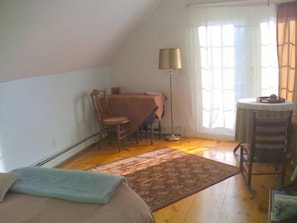 Upstairs bedroom with balcony