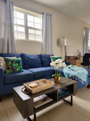 living room is spacious and open to the patio 