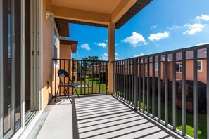 Private balcony with a relaxing view of the greenery.