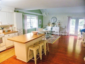 Spacious and beautiful open floor plan.  View of kitchen and dining area.