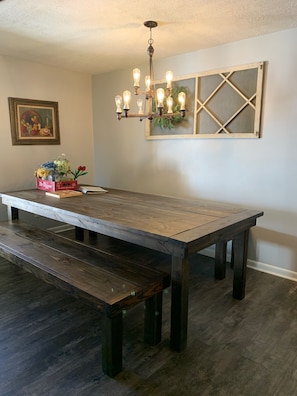 9ft custom farmhouse table. Perfect for large gatherings and events. Seats 12-15