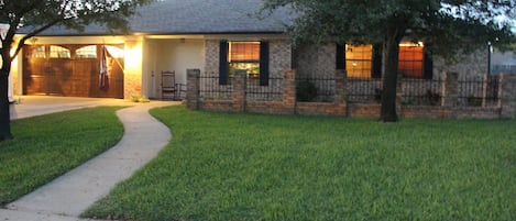 Curb side at dusk. 