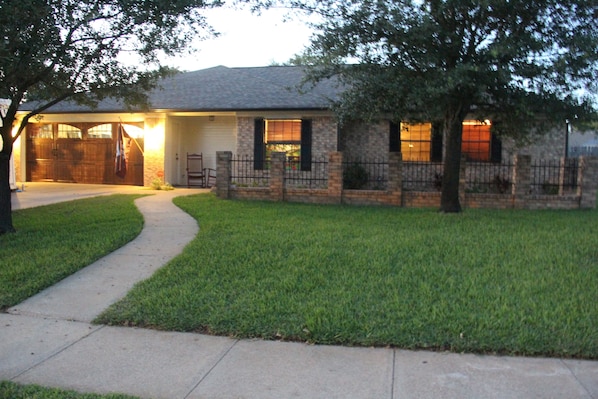 Curb side at dusk. 