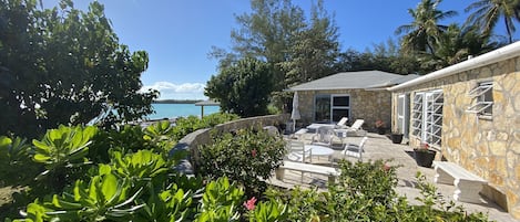 Seaside terrace - steps to the beach and a view of Levy Island across the bay.