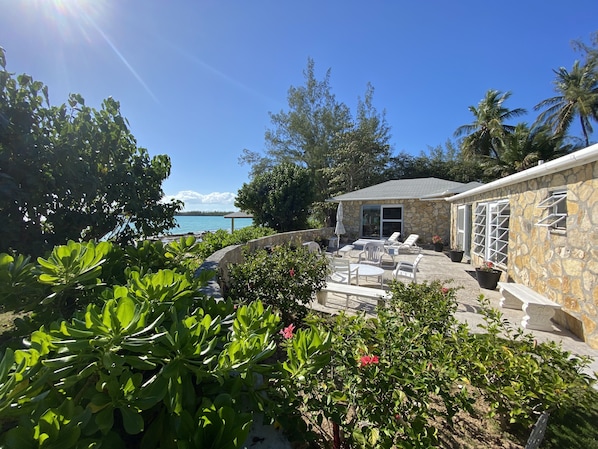 Seaside terrace - steps to the beach and a view of Levy Island across the bay.