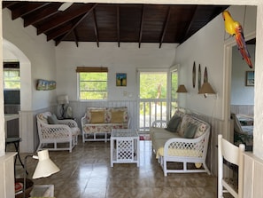 Charming island art decorates the cottage throughout.