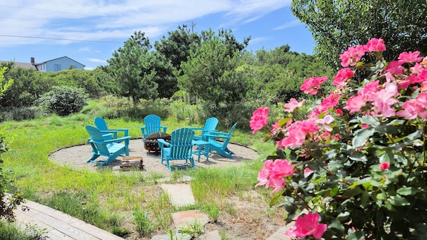 Relax around the fire pit near the deck