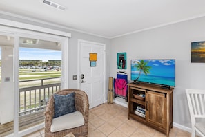 Smart TVs in both rooms, games, and beach items for guest use.