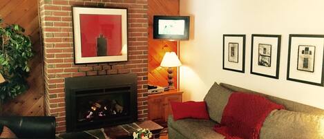Living Room. New fireplace makes a warm gathering place. 