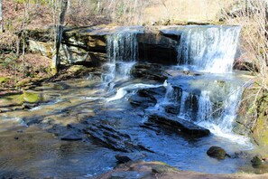Private waterfall across the road from the beach